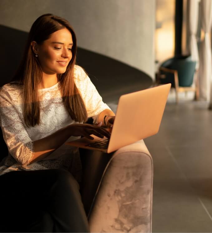 the-young-charming-business-woman-at-the-laptop-2023-11-27-05-30-17-utc (1)