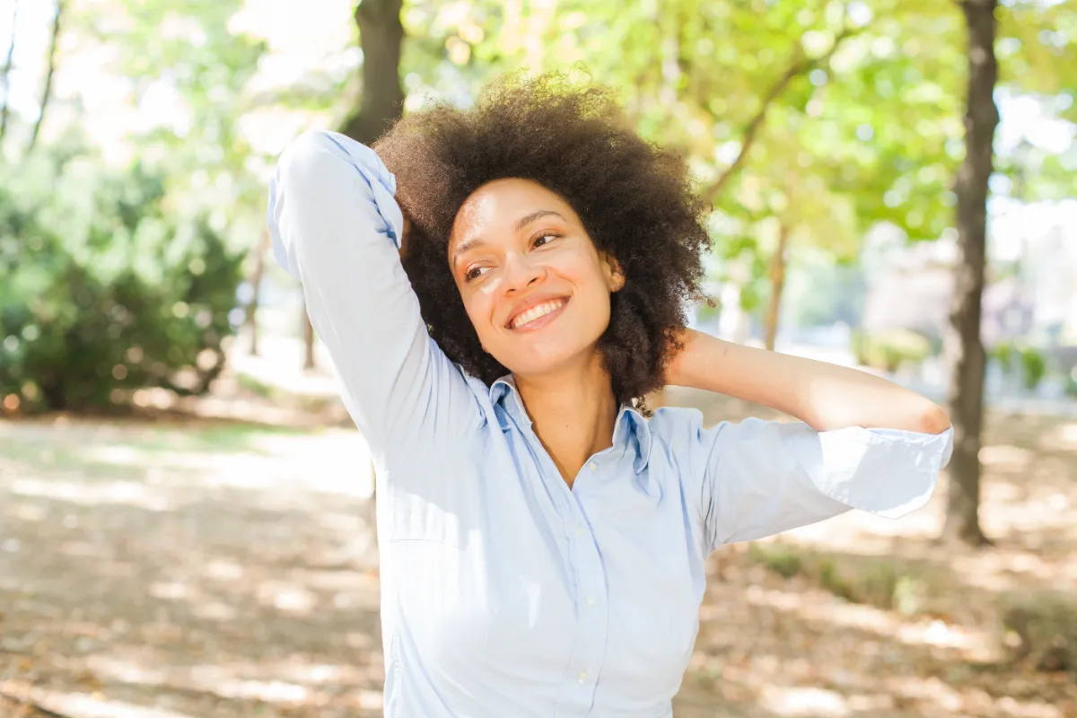 beautiful smiling african young woman relax in nat utc