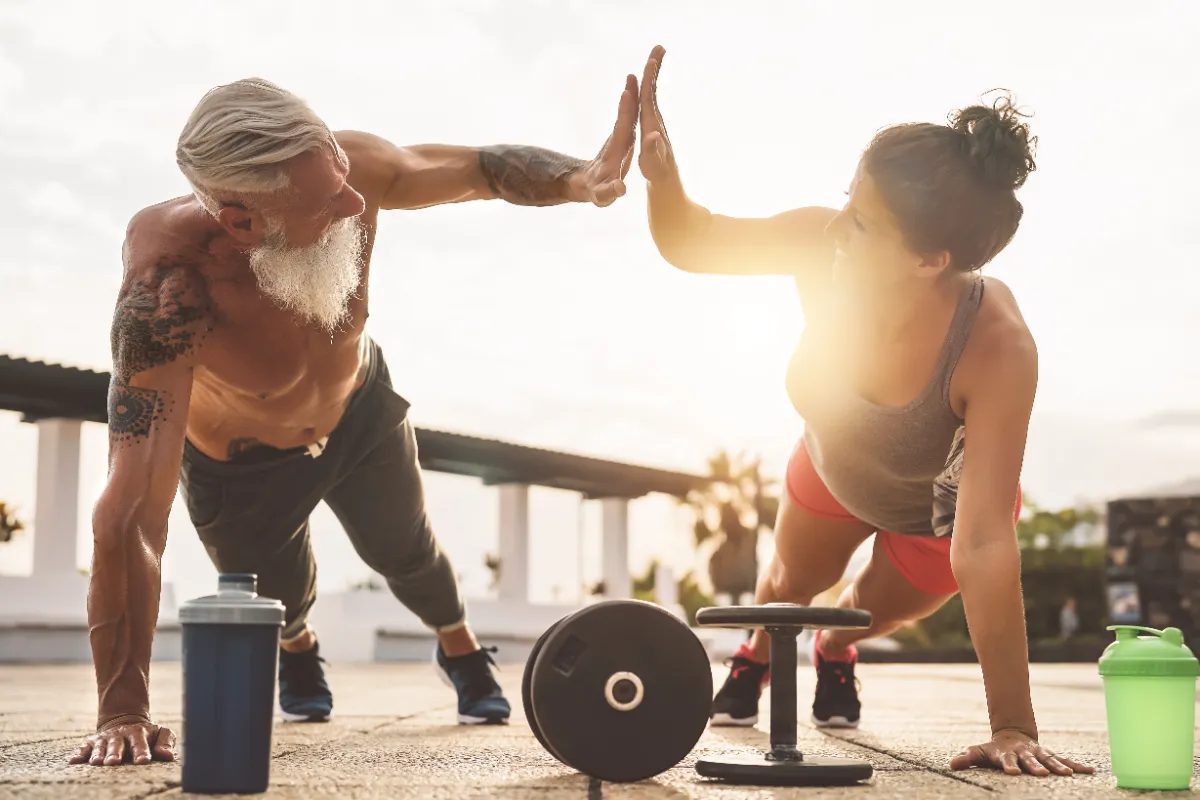fitness couple doing push ups exercise outdoor h utc