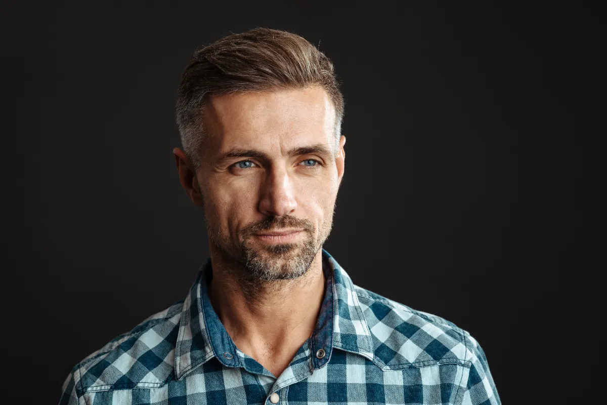 serious grey haired man posing isolated utc