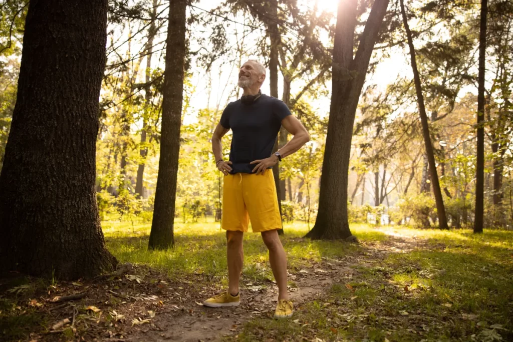 man enjoying nature in the warm sunlight utc